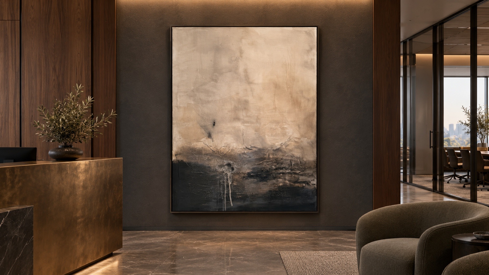 Dust, a tall bone and ochre textured painting in a hotel lobby with a bronze reception desk